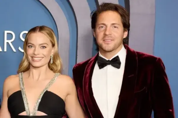 Margot Robbie and Tom Ackerley